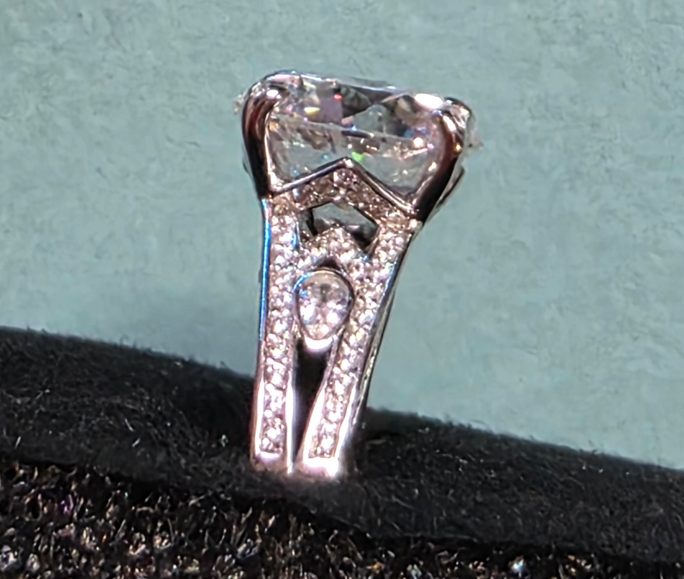 102 Sz 9 5ctw+ Platinum Plated over .925 Sterling Silver with pave accent stones on Band top & sides.