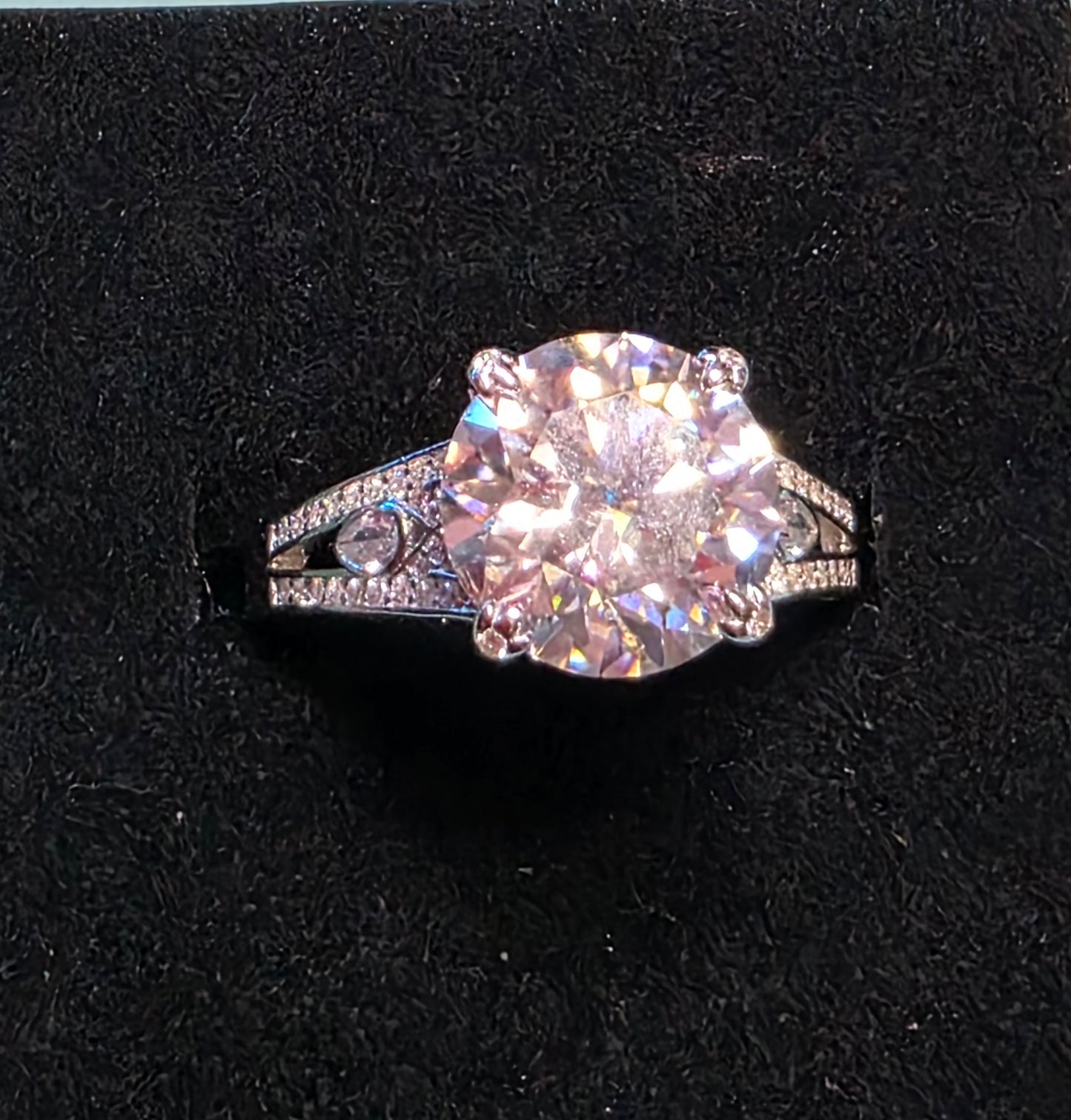 102 Sz 9 5ctw+ Platinum Plated over .925 Sterling Silver with pave accent stones on Band top & sides.