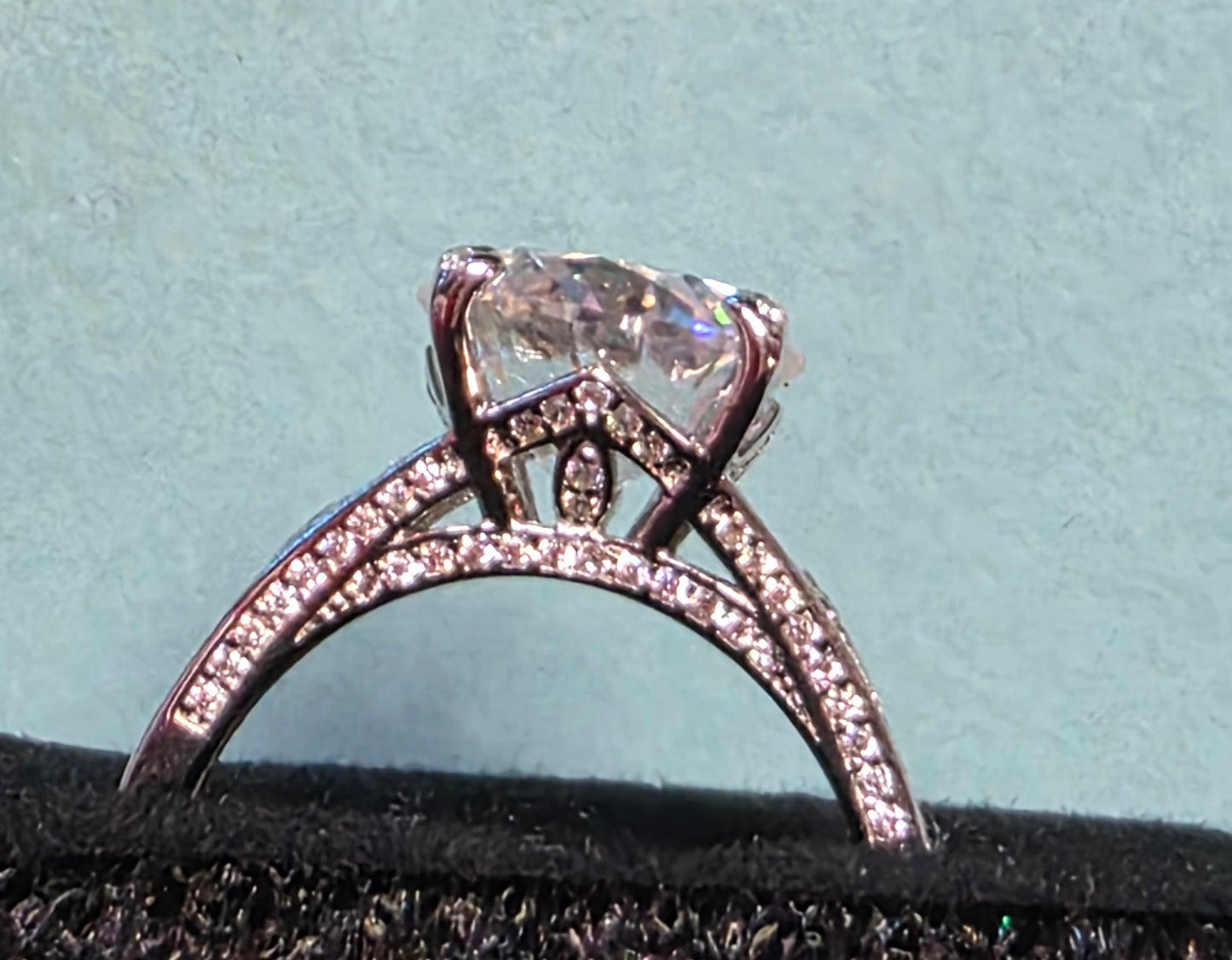 102 Sz 9 5ctw+ Platinum Plated over .925 Sterling Silver with pave accent stones on Band top & sides.