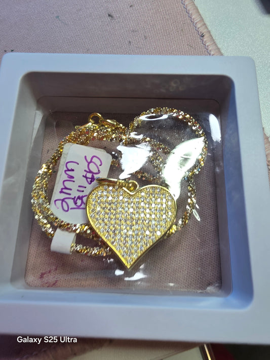 1.28 approx Moissanite pendent and 18" 2mm chain